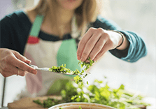 Woman making a salad